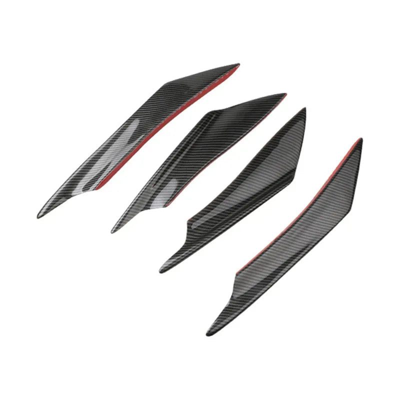 Set of four carbon fibre effect ABS plastic bumper blades for car modification.