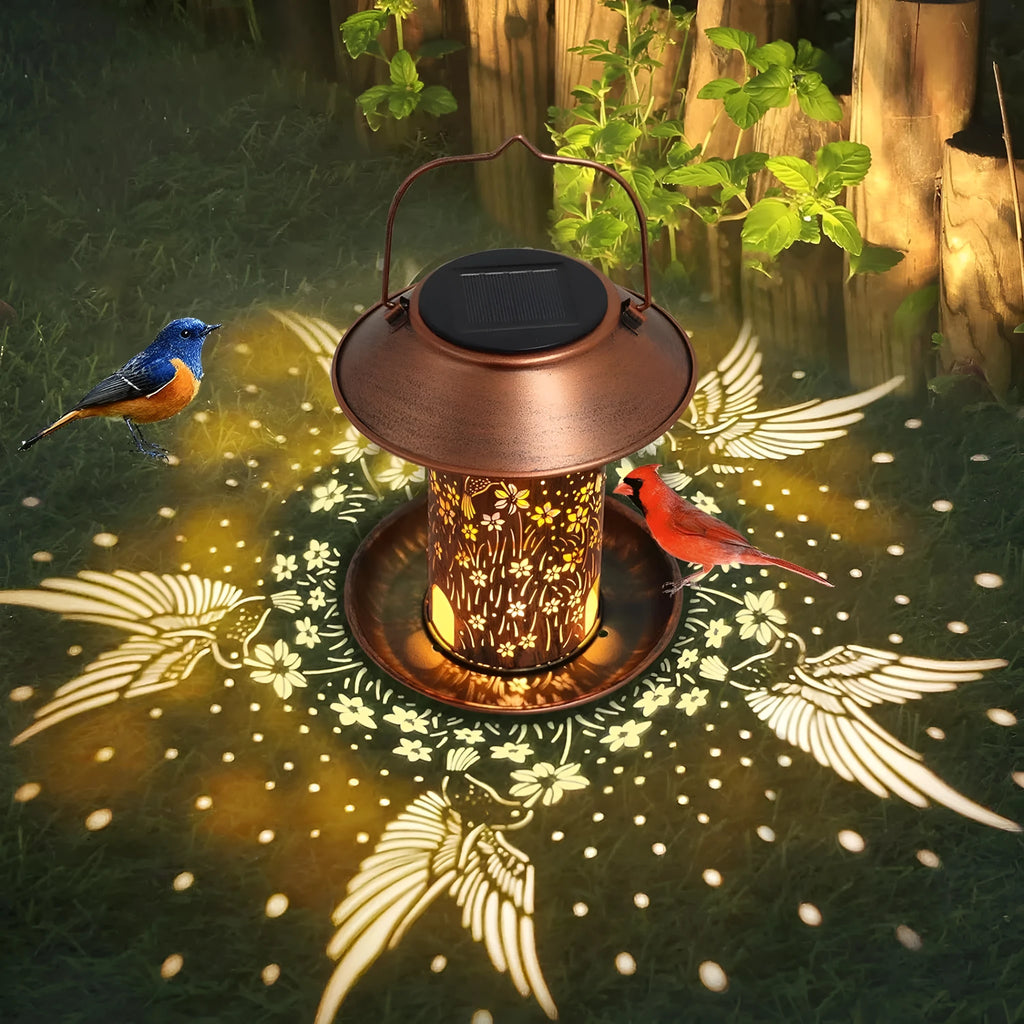 Solar-powered hummingbird pattern iron art bird feeder with LED lighting for outdoor garden decoration
