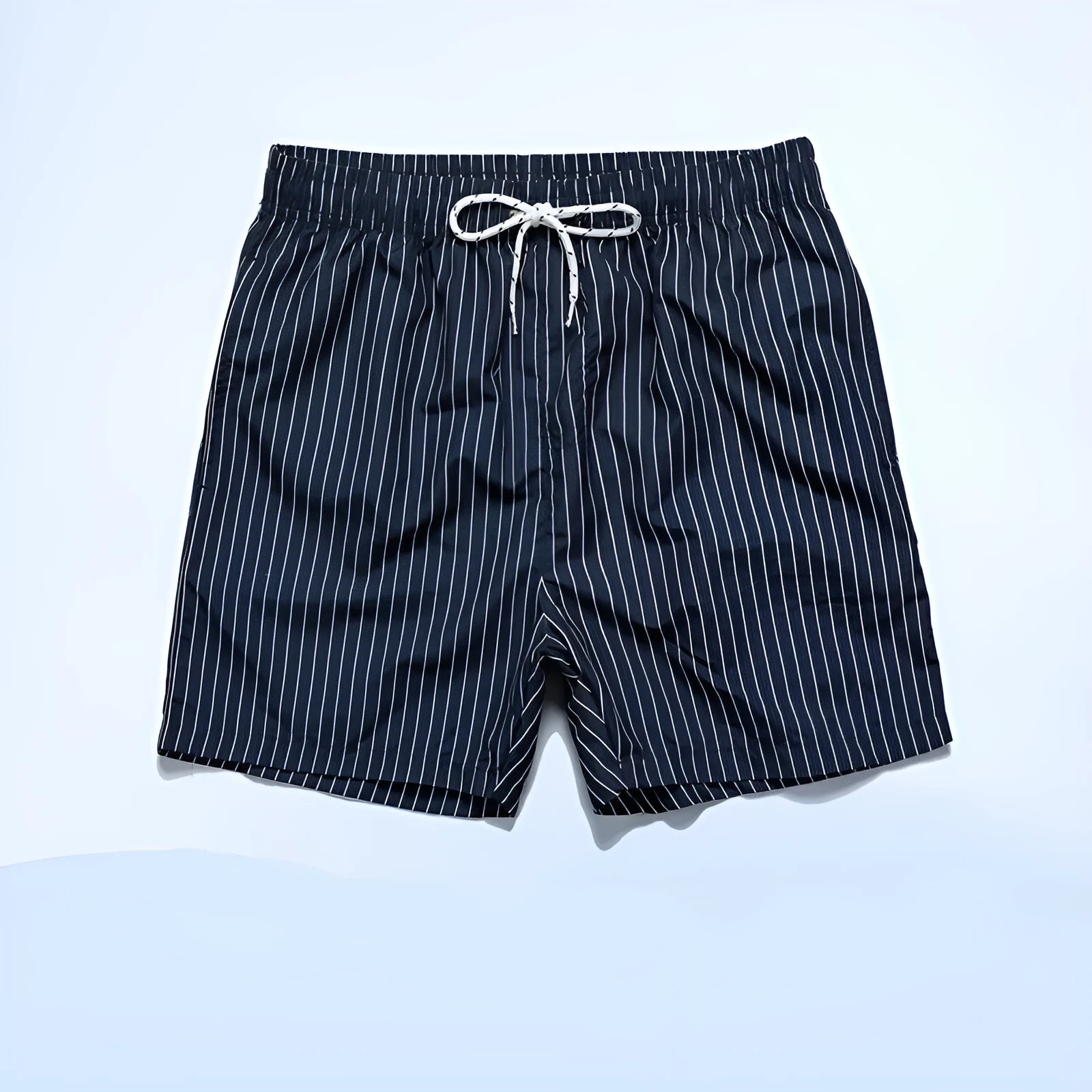 Men's navy blue and grey striped polyester beach shorts with a straight leg cut, laid flat.