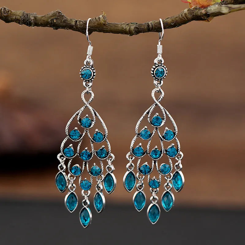 Purple retro fringe drop earrings with crystal detailing and ethnic styling