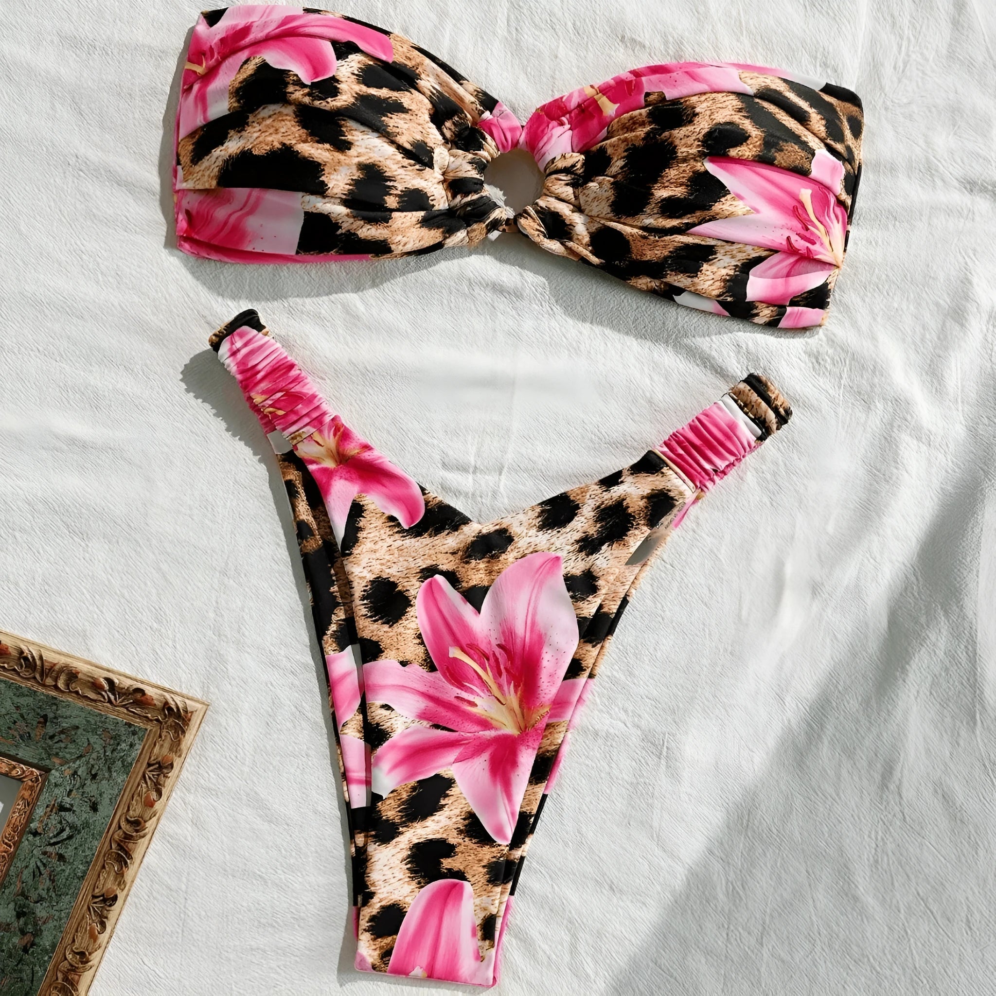 Pink leopard print women's tube top split bikini swimsuit on white background