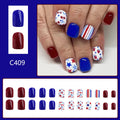 Short glossy red and blue strawberry cherry false nail stickers Independence Day themed 24 piece set.