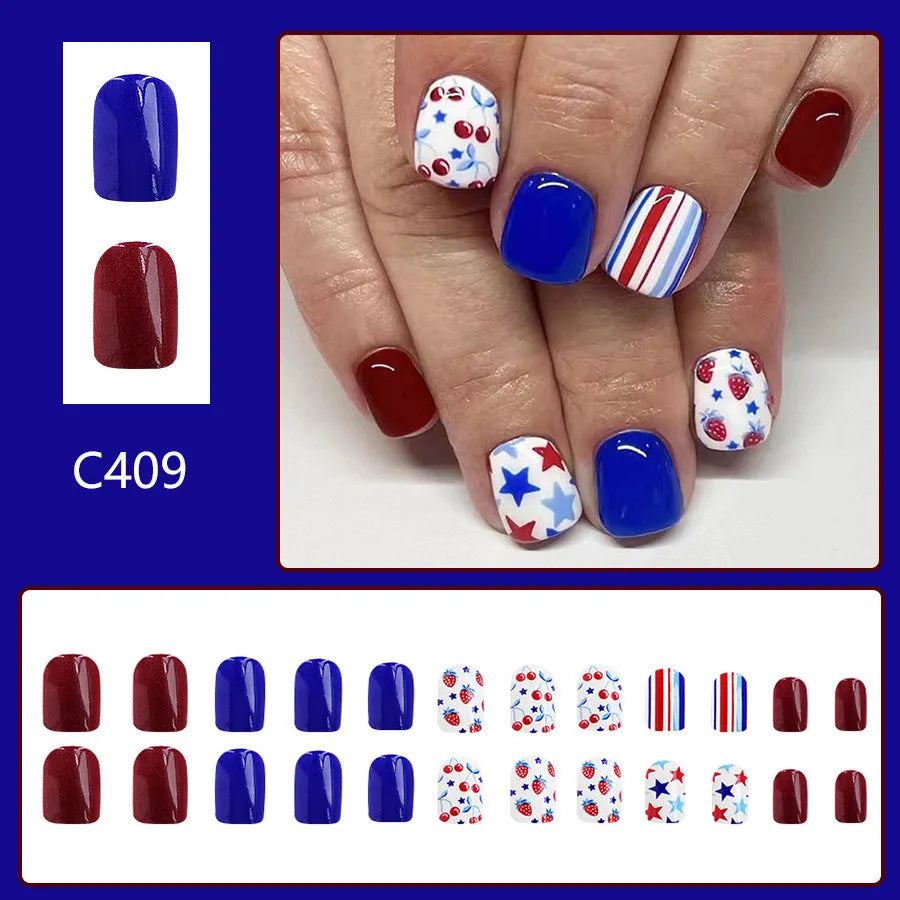 Short glossy red and blue strawberry cherry false nail stickers Independence Day themed 24 piece set.