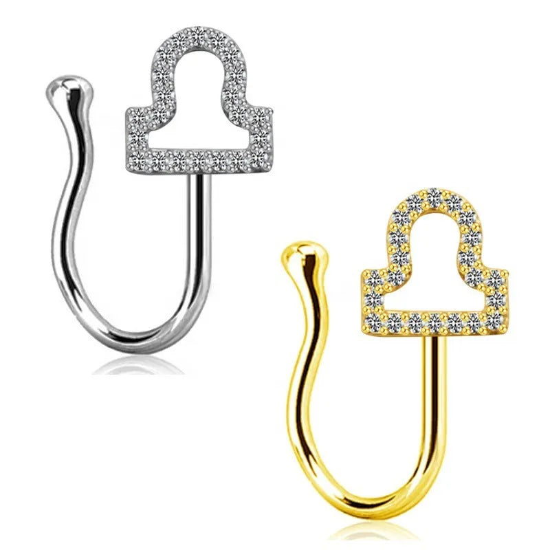 Copper geometric nose ring with electroplated K9 finish in Platinum or Gold, shown in twelve zodiac star sign styles.