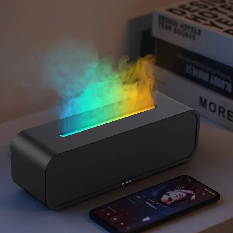 Black and white essential oil diffuser showing flame effect and colour-changing lights with remote control.