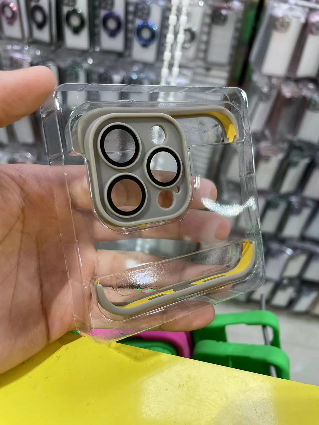 TPU iPhone case with glass lens film and corner pad in black, blue, dark purple or red.
