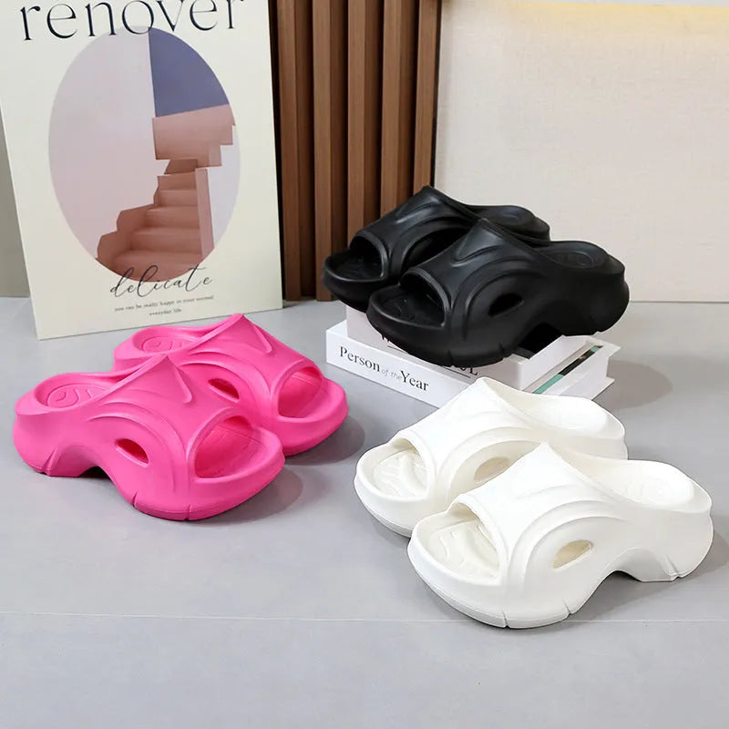 Women's thick-soled EVA slippers in white, black, or rose red with round toe design