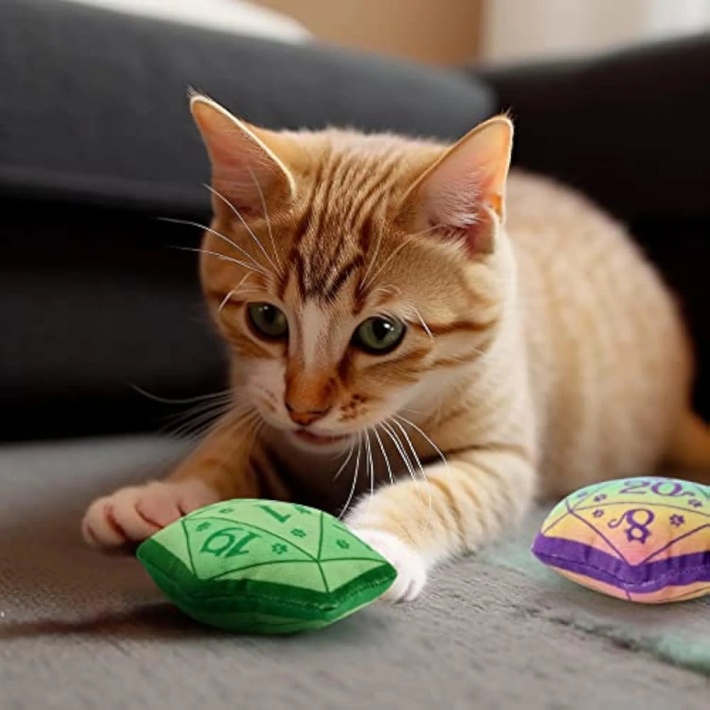Blue dice-shaped plush cat toy with white pips, filled with organic catnip.