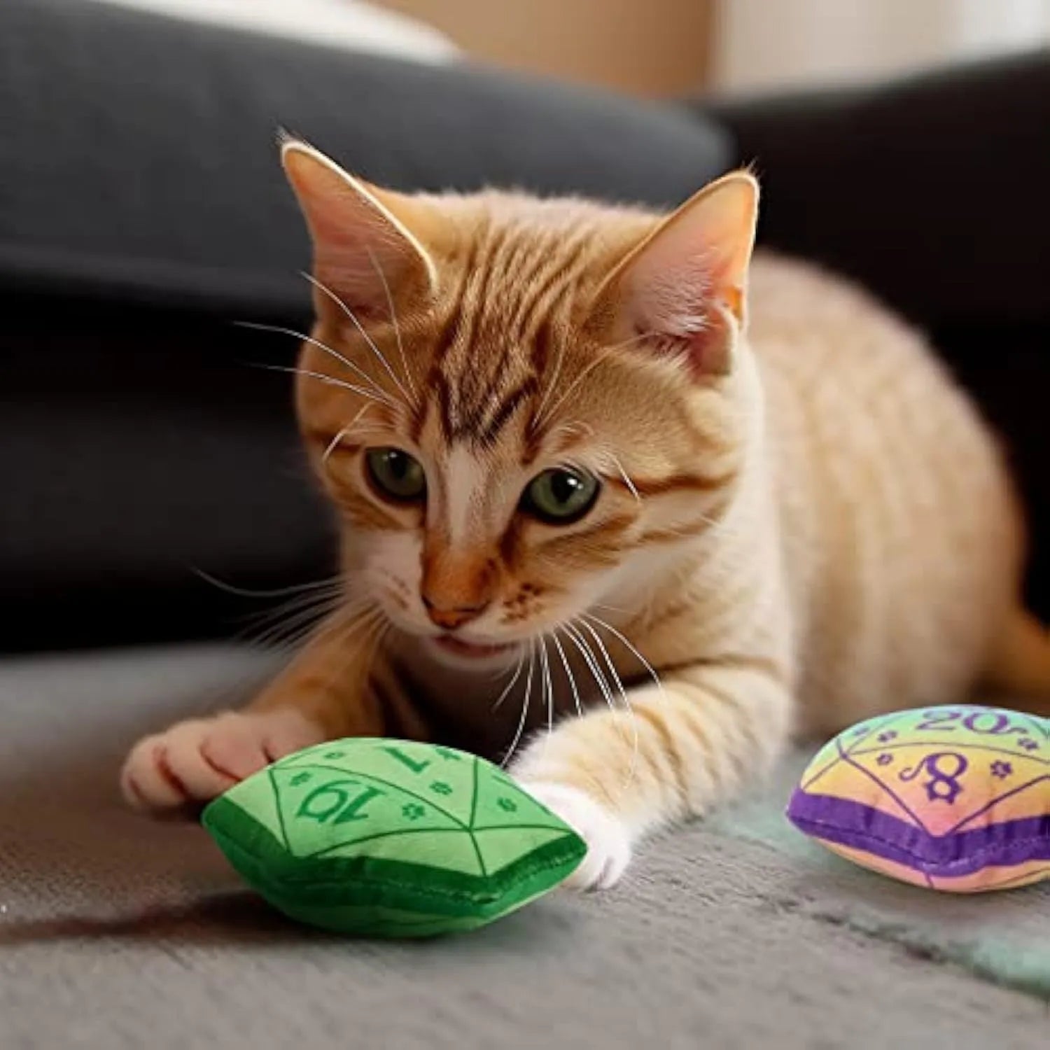 Blue dice-shaped plush cat toy with white pips, filled with organic catnip.