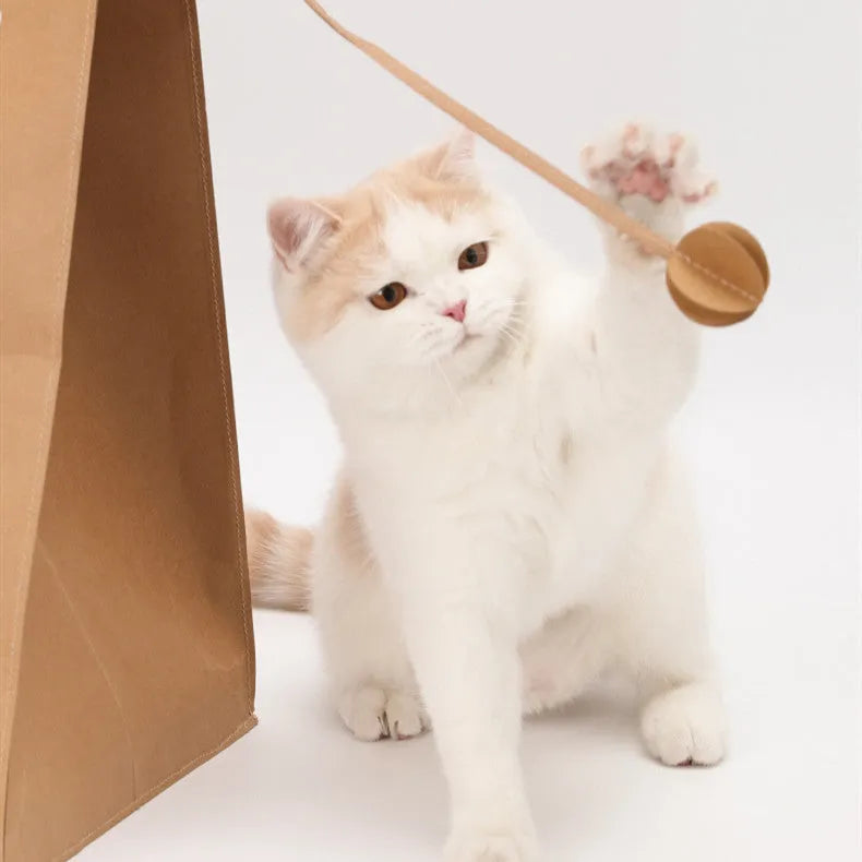 Brown washable kraft paper cat scratching board integrated with enclosed cat nest measuring 40x30x53 cm