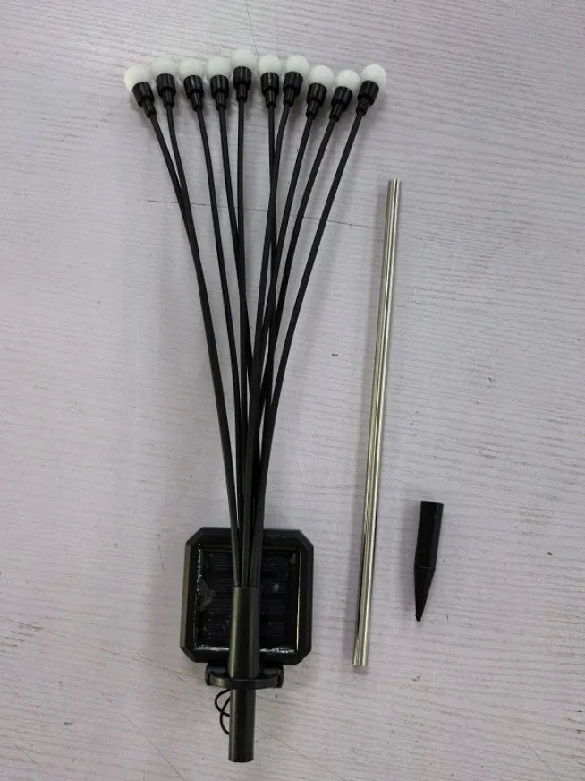 Solar-powered LED firefly ground lamp with multiple heads and ground spike for garden installation