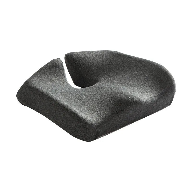 Memory foam office chair cushion with removable mesh cover in grey, shown on a desk chair.