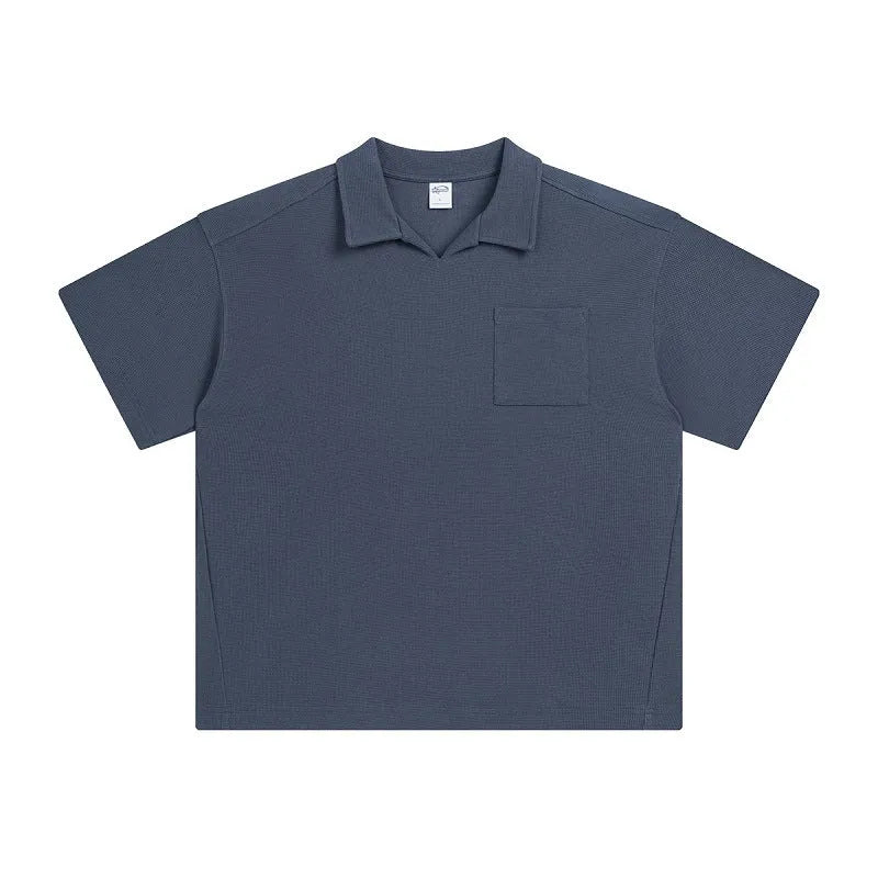 Cotton loose-fit drop-shoulder short sleeve top in Paris forest green, front view, with simple lapel neckline