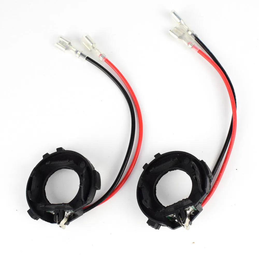 Black H7 LED headlight adapter bracket for Volkswagen vehicles with copper wire connections