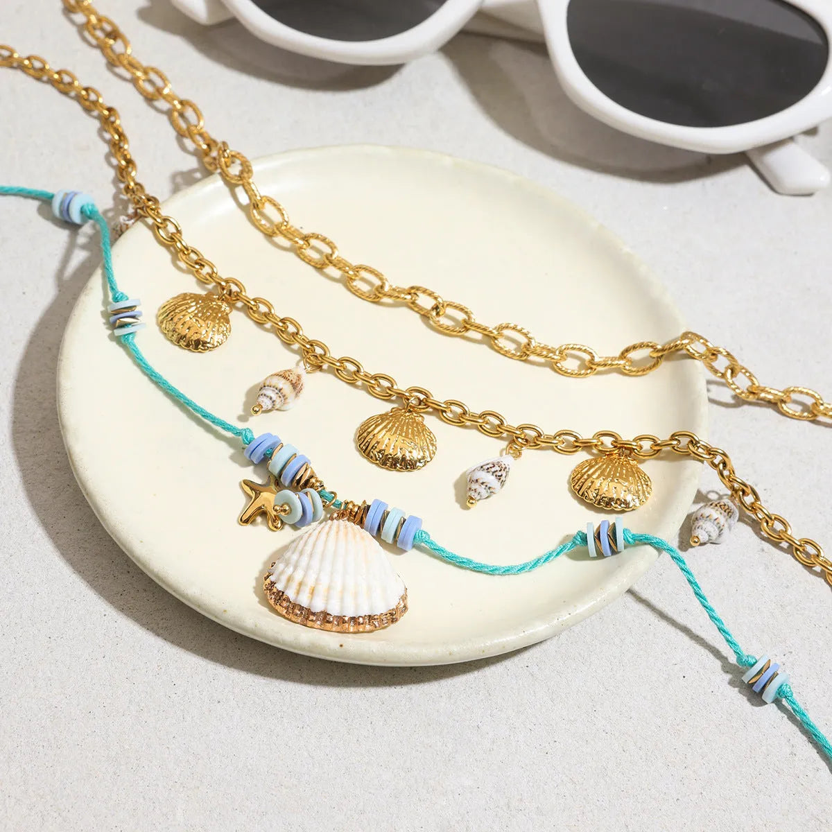 Titanium steel pearl necklace with geometric shell pendant on stainless steel chain