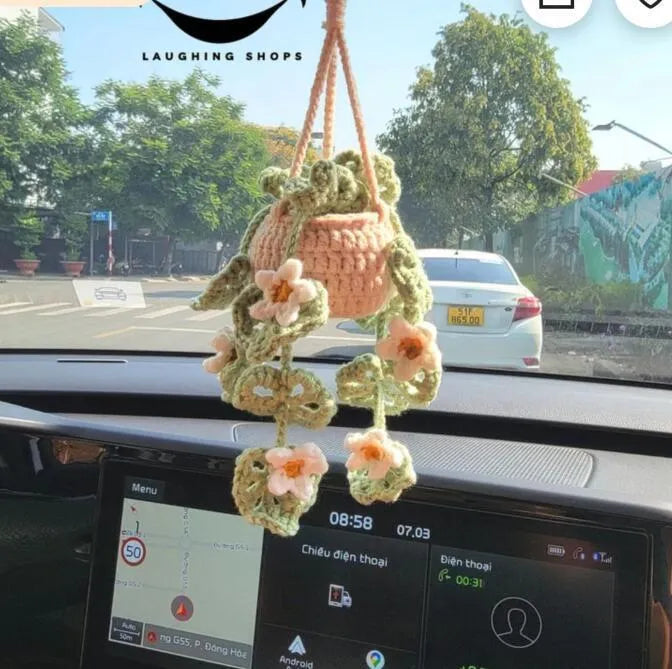 Green and white knitted car plant ornament with hanging rope for dashboard or mirror decoration