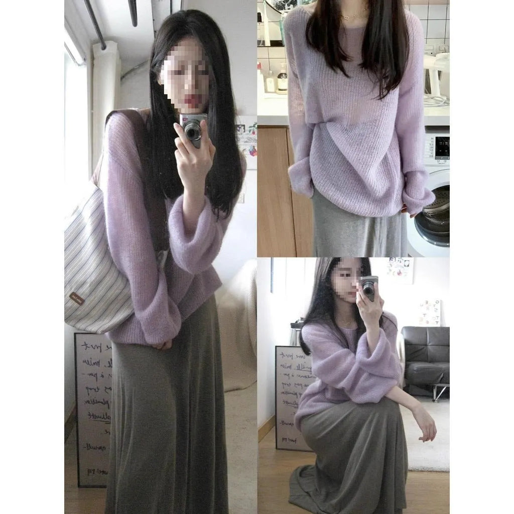 Purple women's blouse with hollow out design and sleeveless princess sleeves on a hanger.