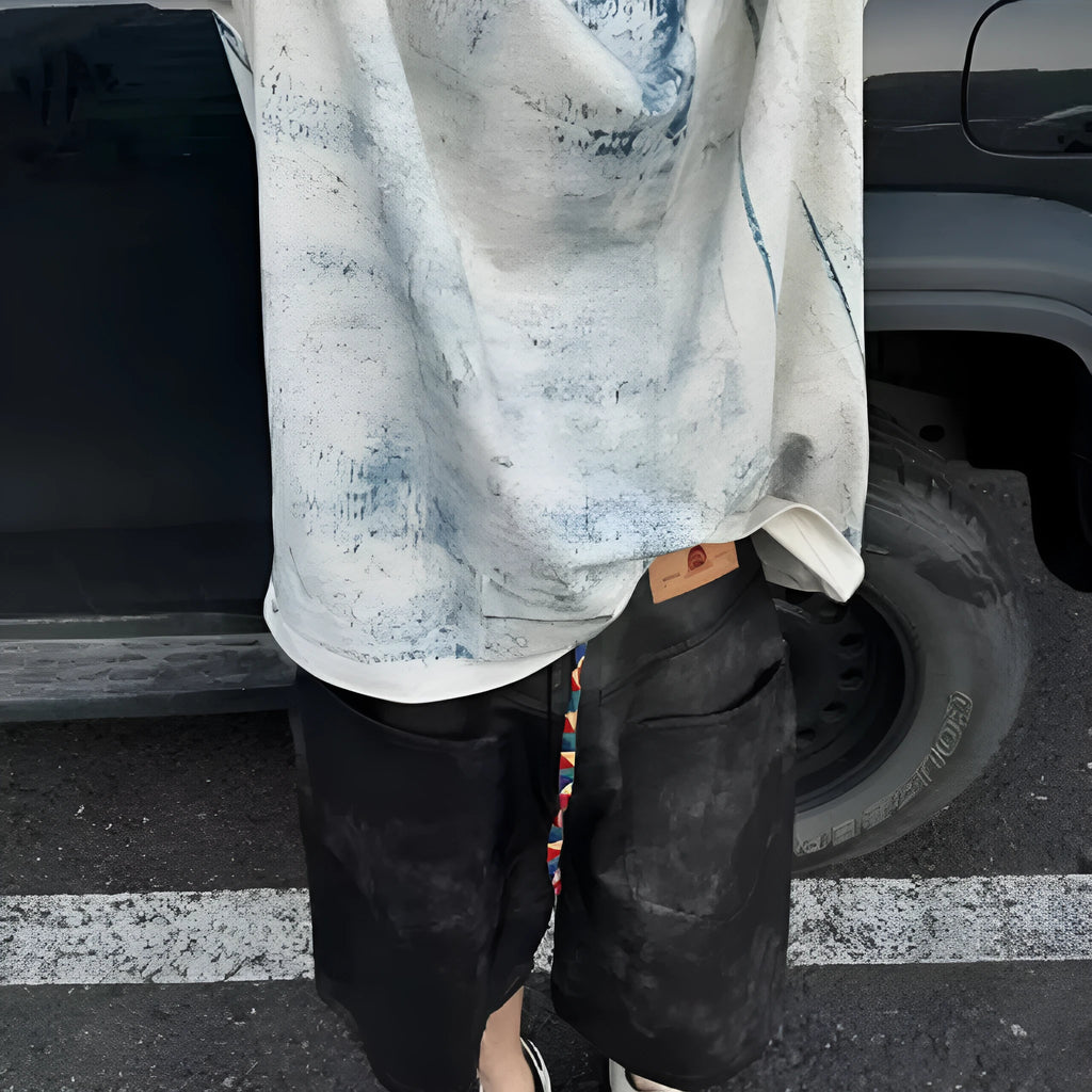 Korean-style solid colour loose fit round neck T-shirt on a hanger, front view.