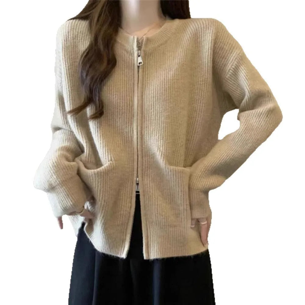 Beige soft viscose long sleeve sweater coat cardigan on a hanger.