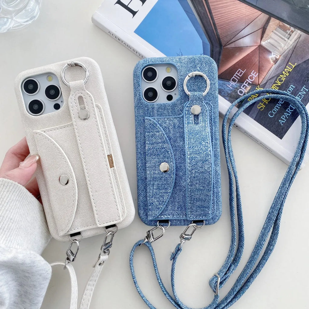 Denim blue leather phone case for iPhone 15 with wrist strap and built-in stand