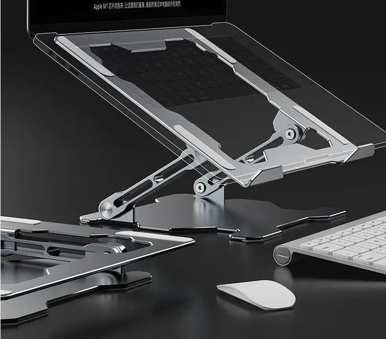 Grey adjustable aluminium laptop stand in folded and open positions on a desk.