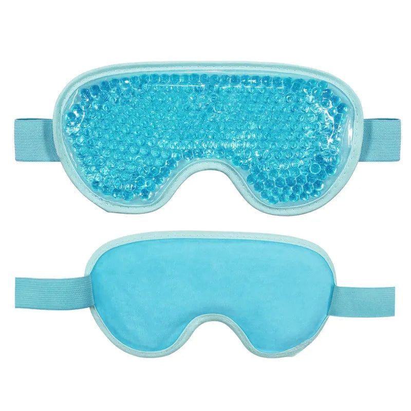 White portable rechargeable eye massager with cold hot compress functions and included eye mask