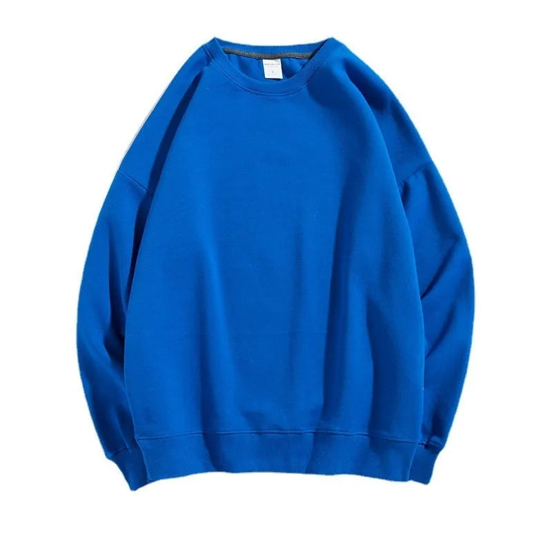 Cotton loose fit off shoulder pullover sweater in a selection of colours on a hanger