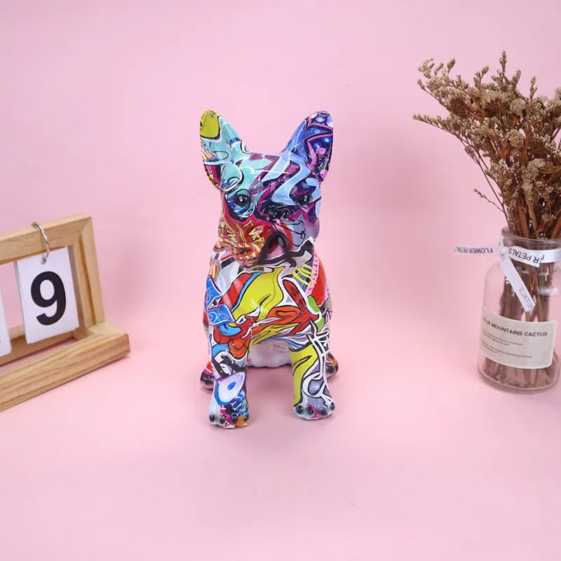 Modern simple resin bulldog statue in graffiti colour on a shelf