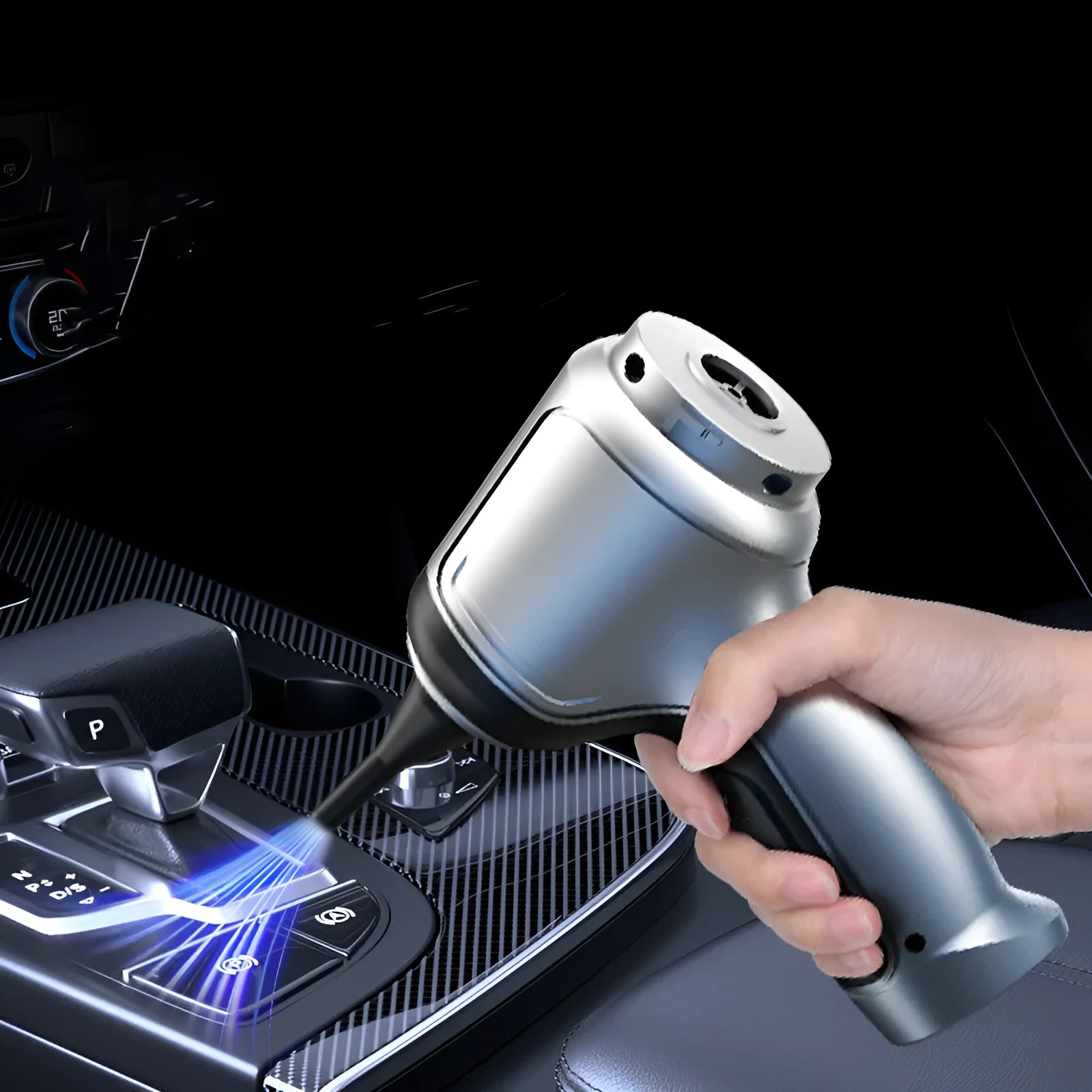 Handheld cordless vacuum cleaner unit for use in cars and homes, showing its portable design.