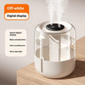 Beige round humidifier with dual spray nozzles, humidity display, and USB power cable