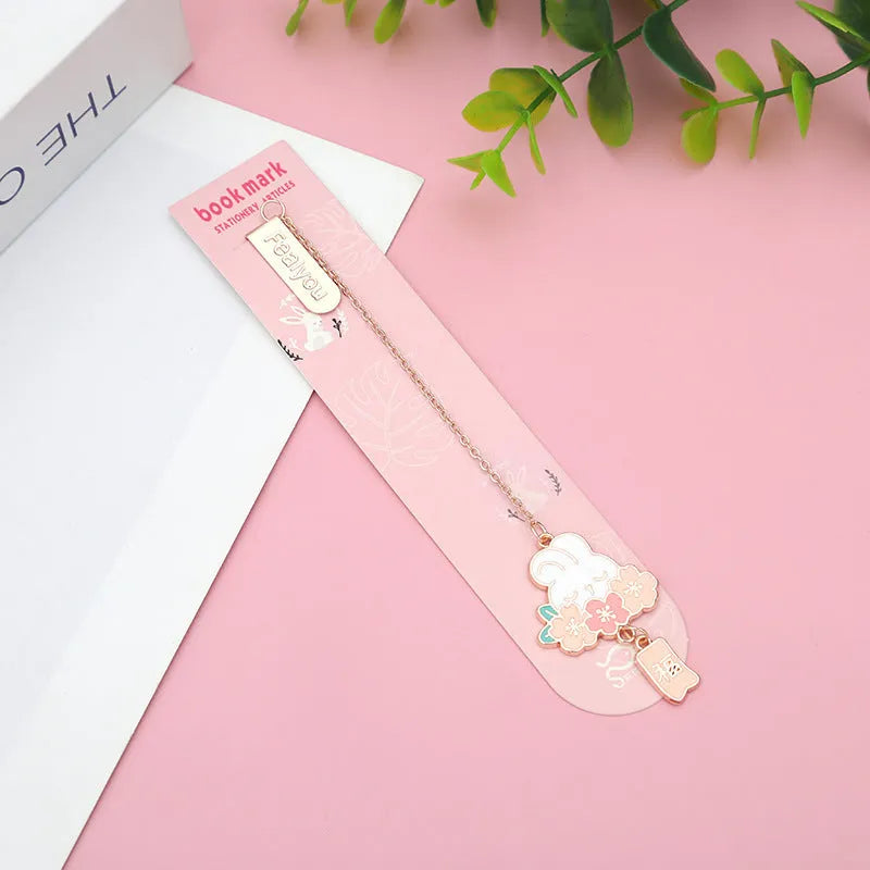 Metal pendant bookmark with cherry blossom cat design and sakura motifs