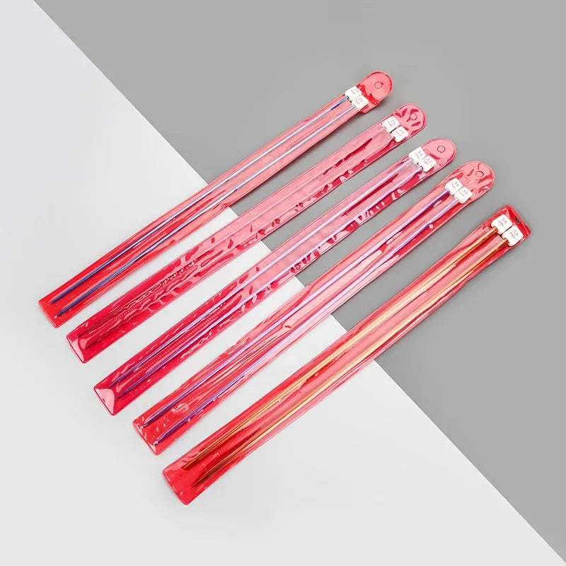 Set of lengthened crochet hooks with protective end caps in sizes from 2.0mm to 10.0mm.