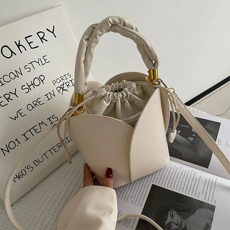 Women's small PU retro bucket bag in apricot with single shoulder strap and soft handle