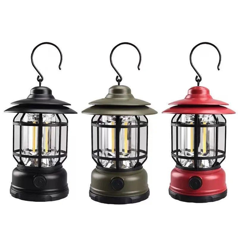 Dark green portable LED camping lantern with head strap, shown on a table with dimensions 16.6cm high.