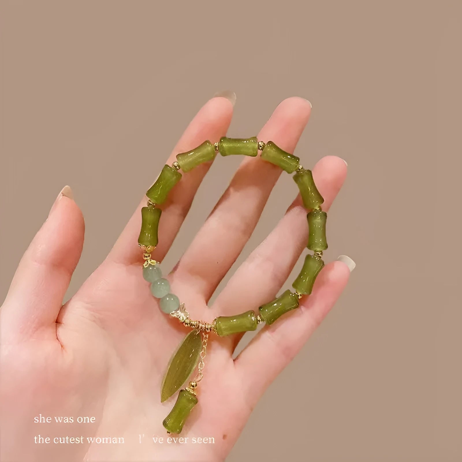 Chinese style glass bracelet with bamboo joint elements in red Lvzhu Duobao design