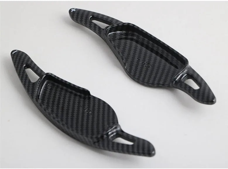 Carbon fibre pattern ABS plastic steering wheel shift paddle replacement for car interior modification.
