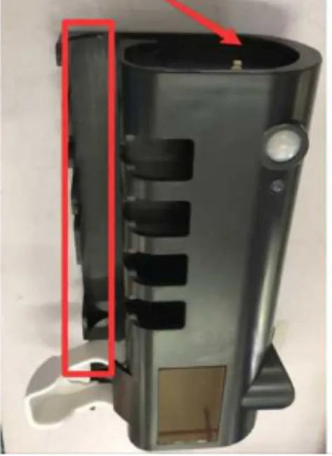 Black wall-mounted toothbrush steriliser with UV light and integrated toothpaste squeezer.