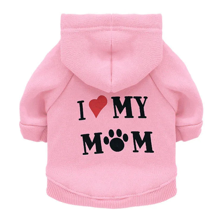 Fleece printed dog clothes in style A on a small dog, with collar opening and four leg holes