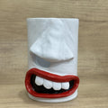 A fun-coloured resin decorative holder for a tissue box, shown on a desktop.