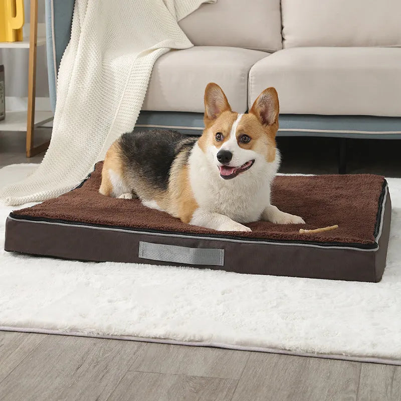 Brown removable cover memory foam dog mat showing size options on a wooden floor.