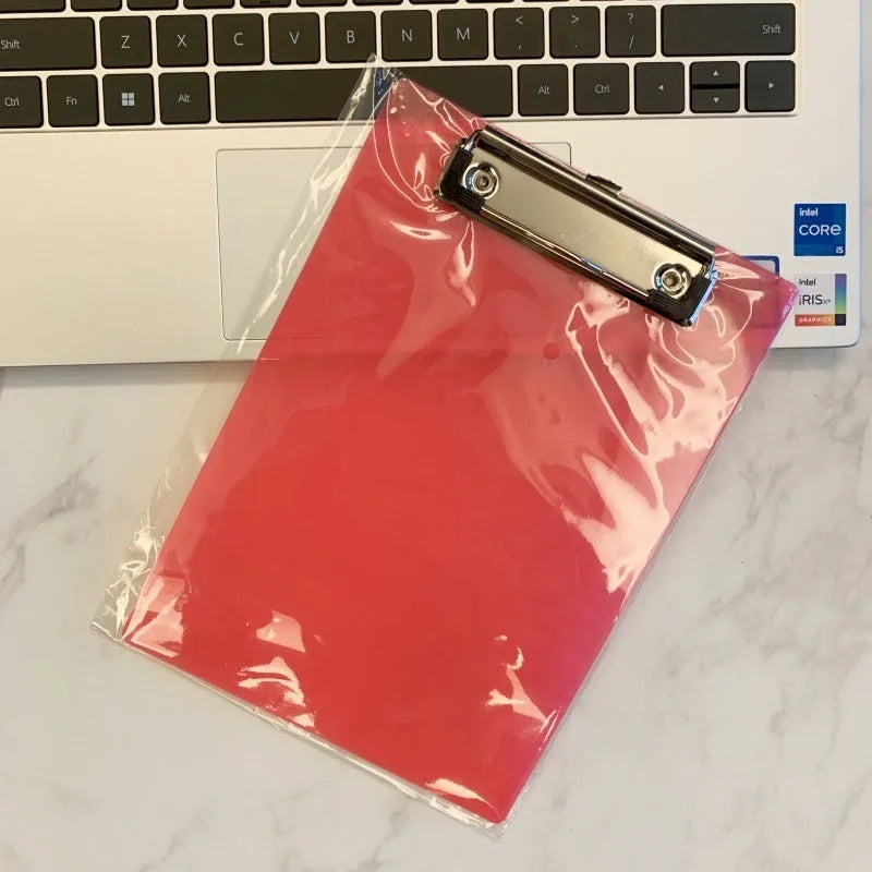 A4 transparent writing board pad with metal clip showing document display and writing surface