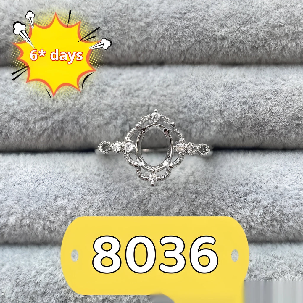 Oval open mouth copper ring with a 6*8 centre stone and five-pointed star ornament detail.