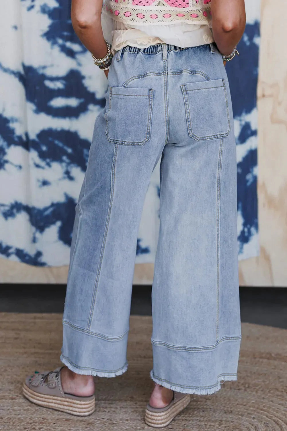 Beau Blue women's wide leg denim trousers with drawstring waist and raw hem detailing