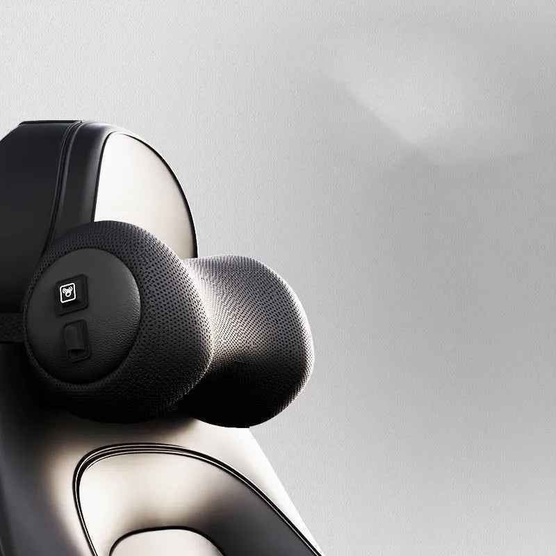 Car seat massage cushion and headrest set made from memory foam in a neutral colour.