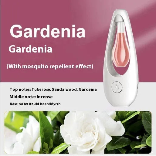 White ultrasonic aroma diffuser with control buttons and mist output, shown with essential oil bottle