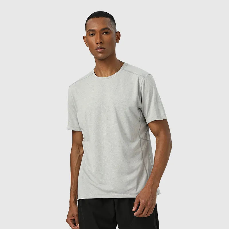 Adult short sleeve sports t-shirt in lightweight polyester, shown in dark grey, with reflective detail.