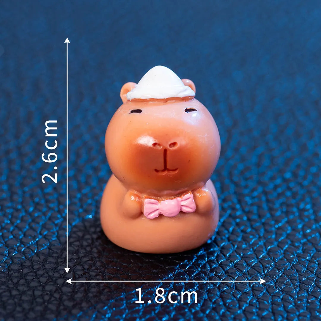 Halloween capybara resin figurine in one of eight designs like pumpkin or vampire.