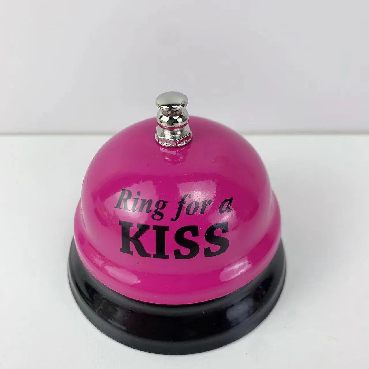 Iron game bell shown in one of ten available colours: blue, green, pink, red, yellow, green tea, or rose kiss.