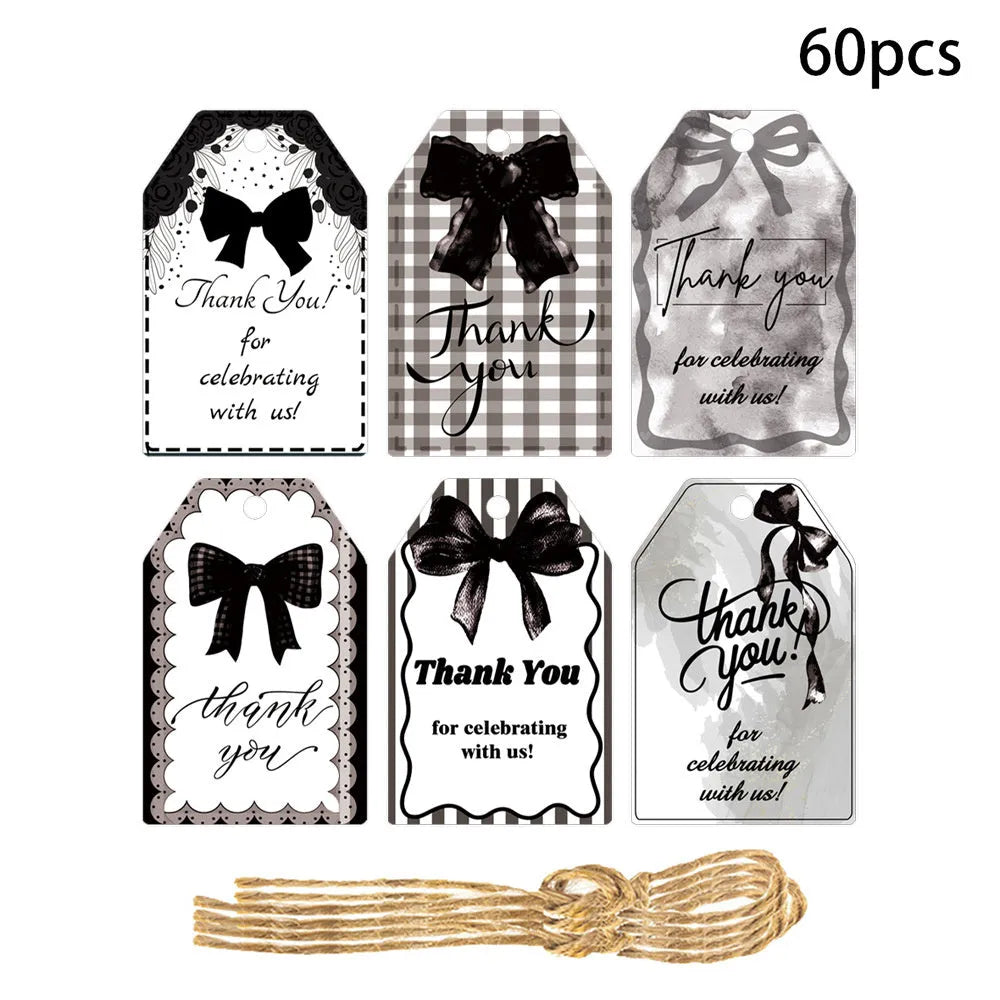 60-piece set of birthday party gift label tags with bowknot designs and natural hemp rope.