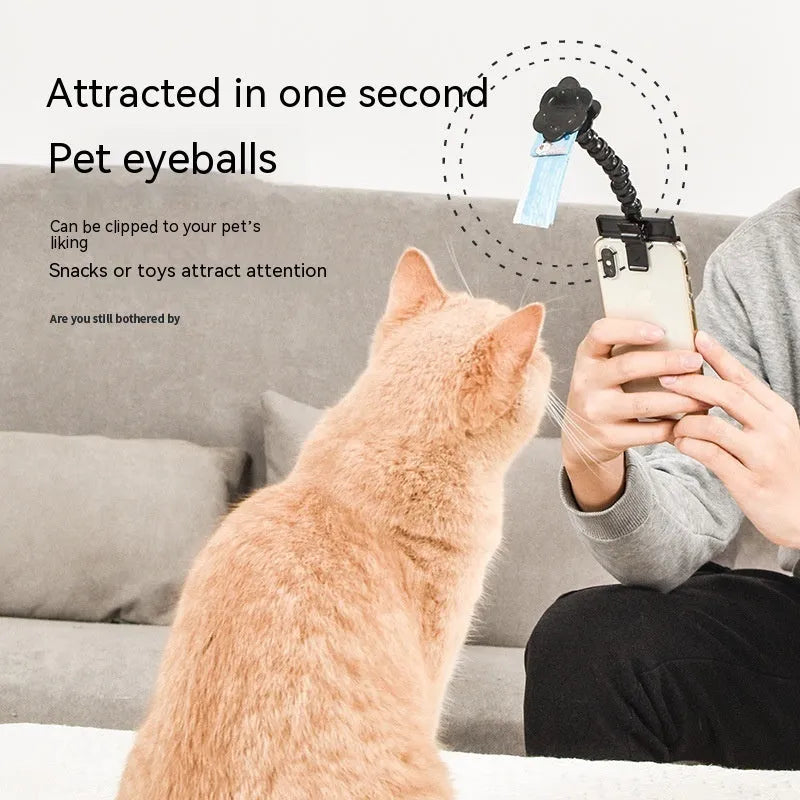 Black pet photography clip holder with rotating attachment for mobile phones and pet treats